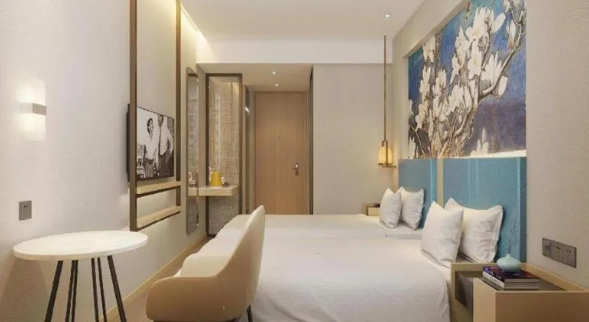 Bed in Jinjiang Inn Jinan Shimao Kuanhouli Quancheng Road