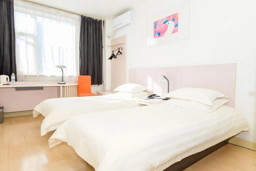 Bed in Jinjiang Inn Jinan Shimao Kuanhouli Quancheng Road