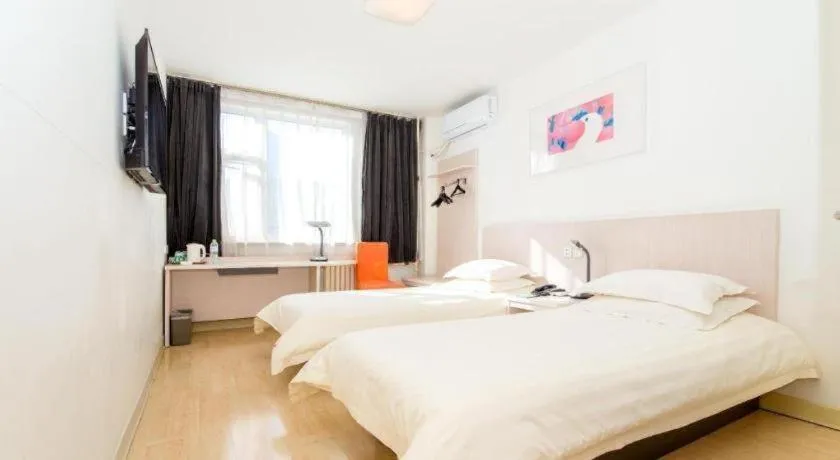 Bed in Jinjiang Inn Jinan Shimao Kuanhouli Quancheng Road