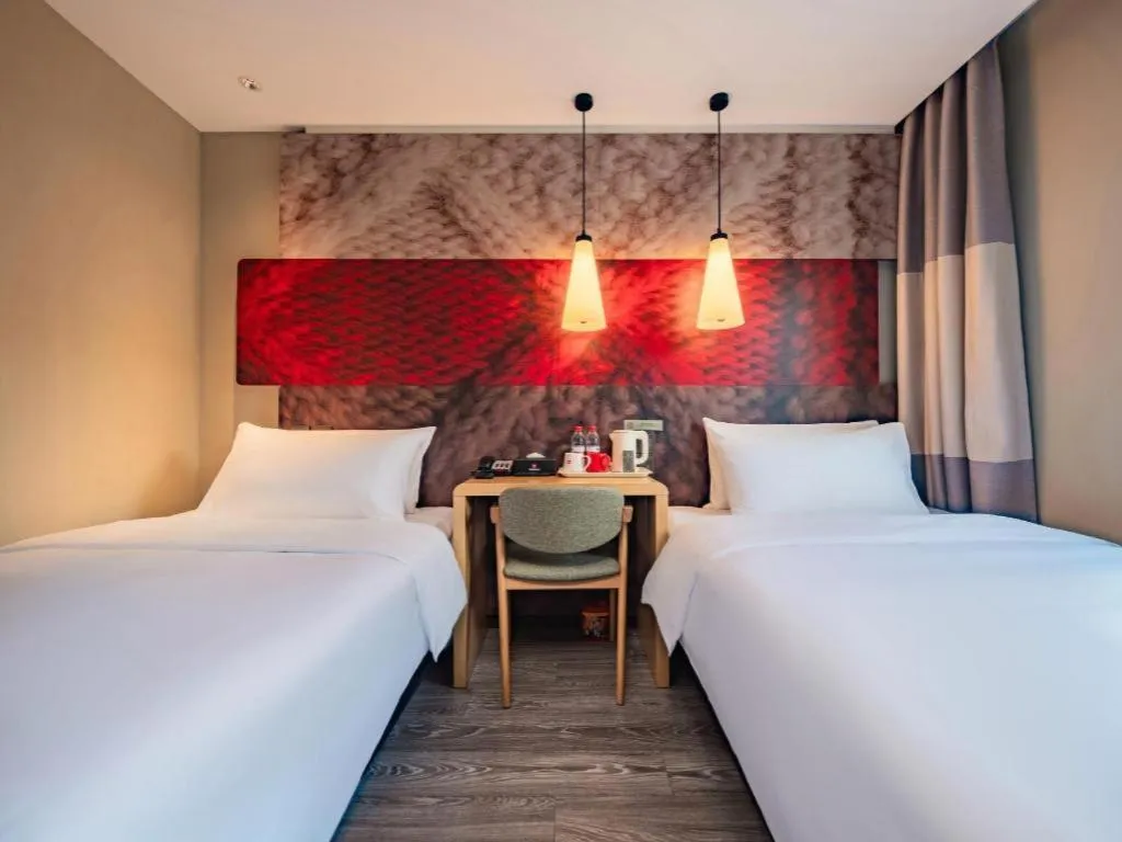 Bed in Ibis Chengdu Yongfeng Hotel