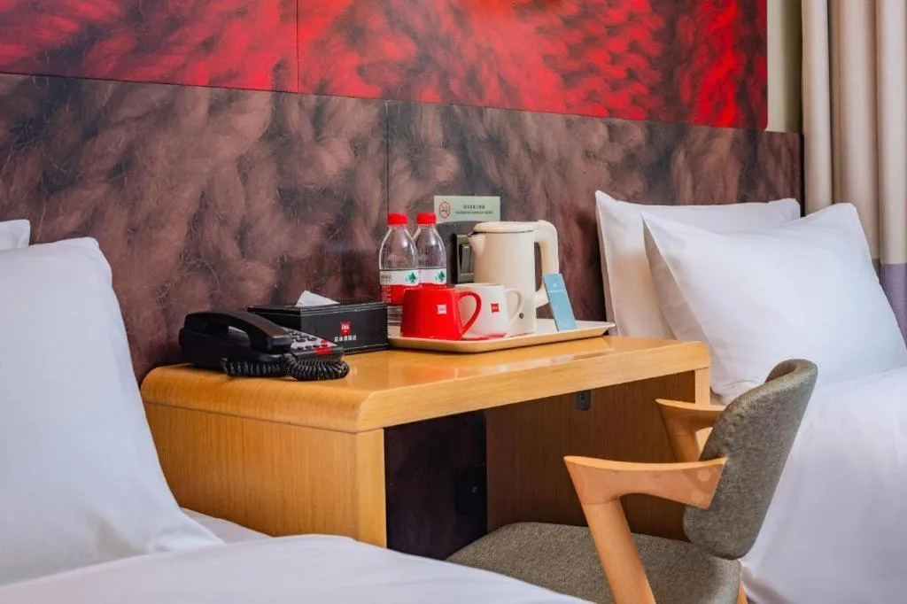 Bed in Ibis Chengdu Yongfeng Hotel