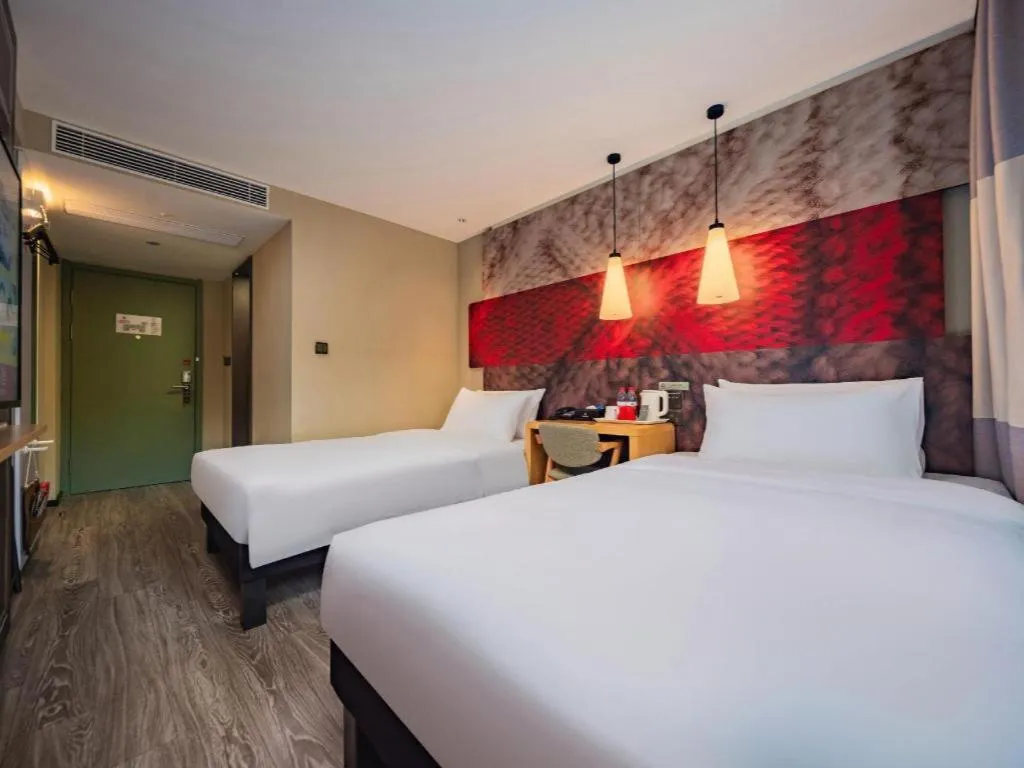 Bed in Ibis Chengdu Yongfeng Hotel