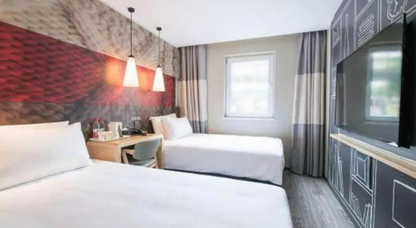 Bed in Ibis Chengdu Yongfeng Hotel