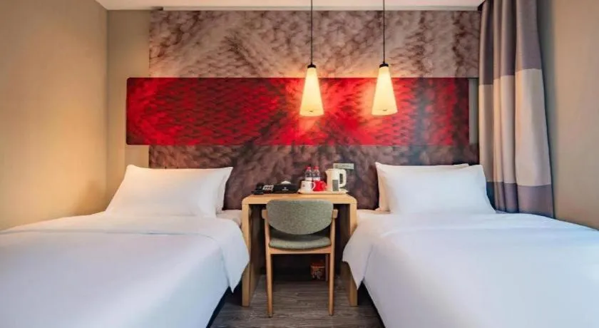 Bed in Ibis Chengdu Yongfeng Hotel