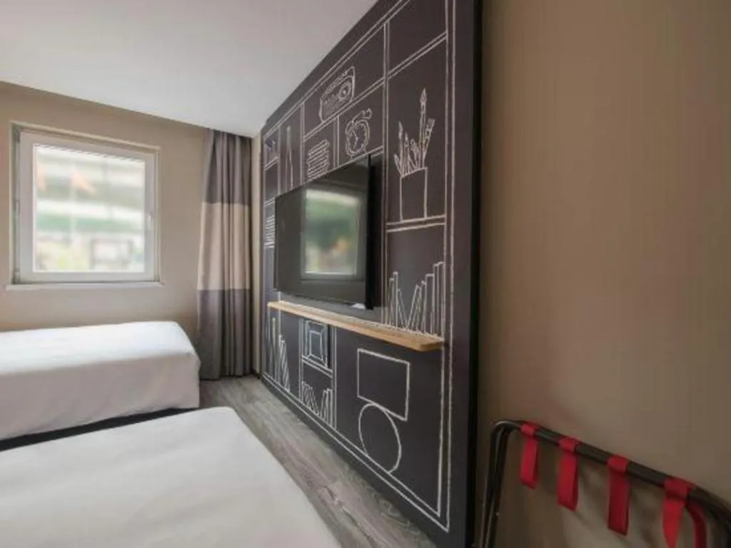 Bed in Ibis Chengdu Yongfeng Hotel