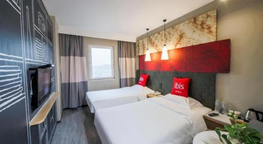 Bed in Ibis Chengdu Kehua Hotel