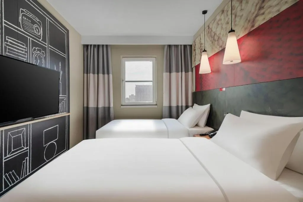 Bed in Ibis Chengdu Kehua Hotel