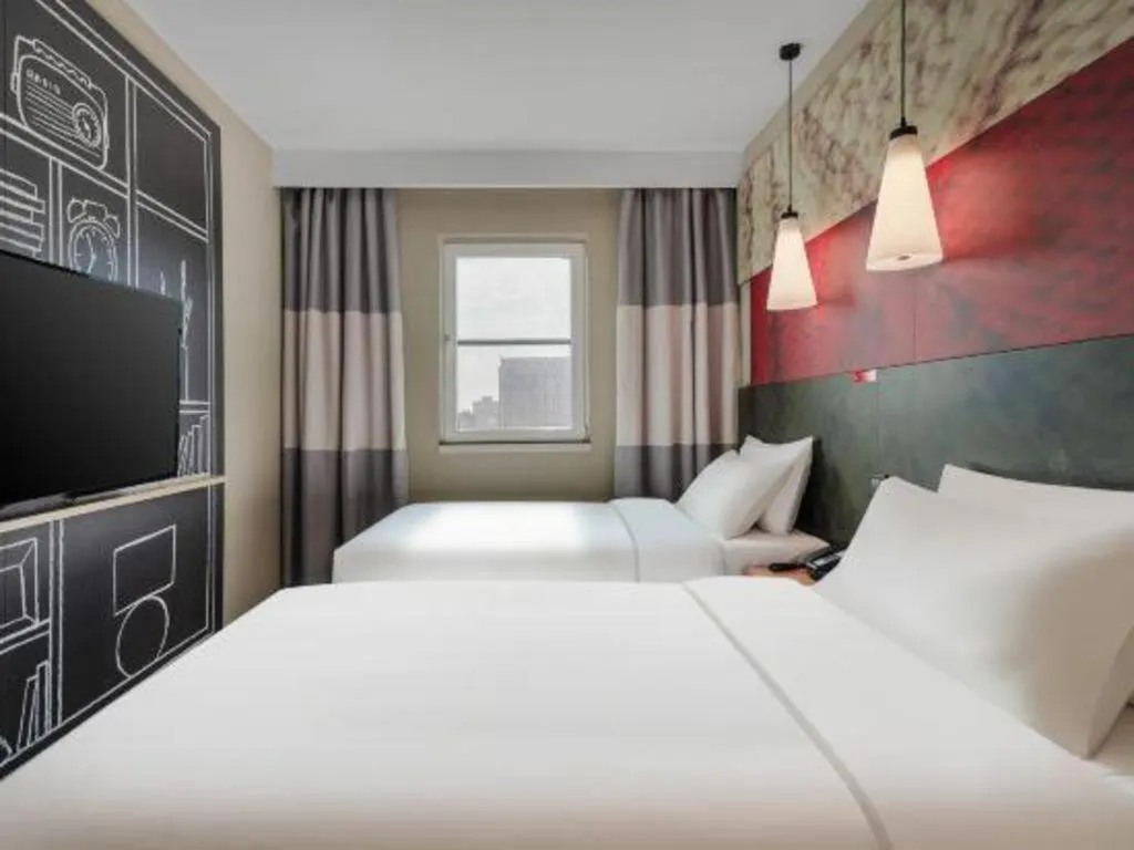 Bed in Ibis Chengdu Kehua Hotel