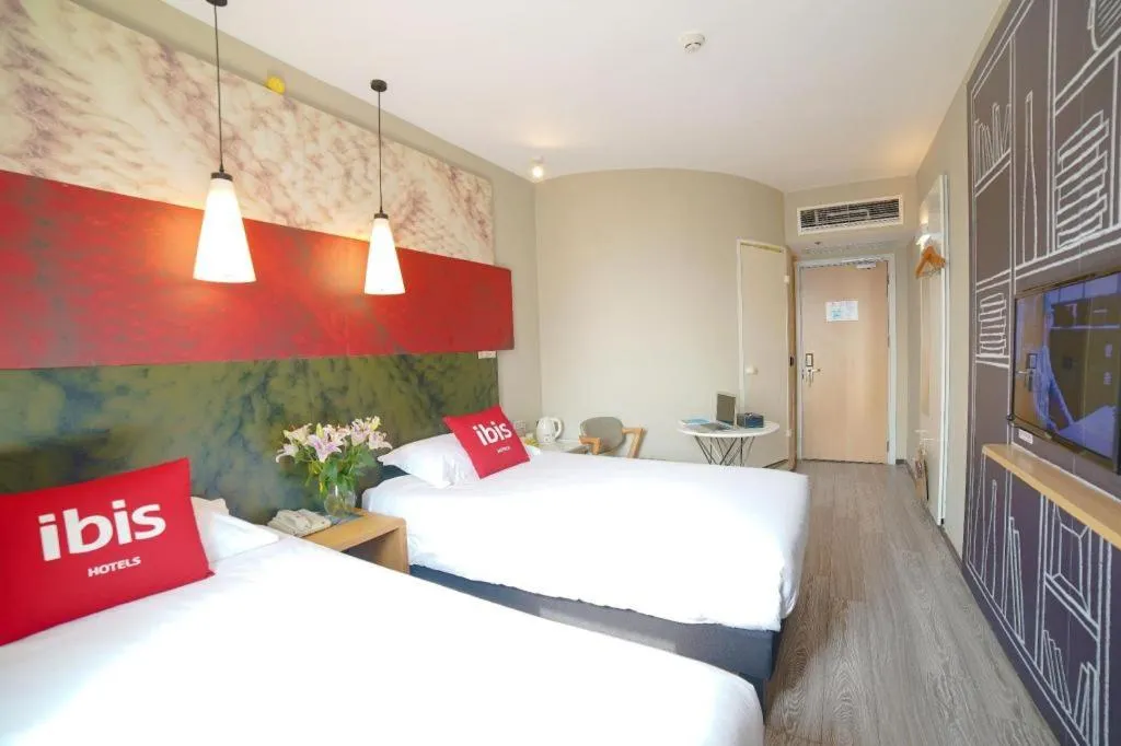 Bed in Ibis Chengdu Kehua Hotel