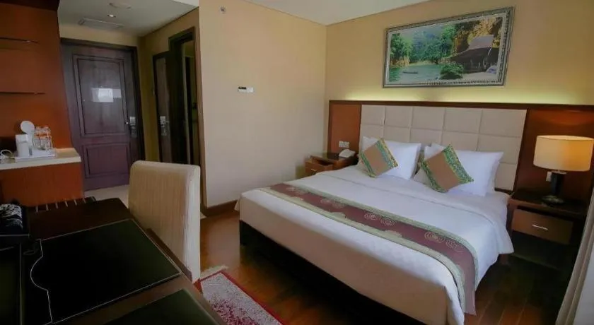 Bed in Grand Qin Hotel Syariah