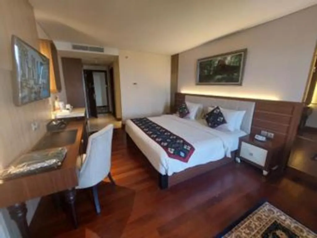 Bed in Grand Qin Hotel Syariah