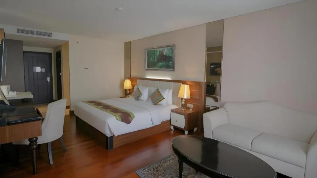 Bed in Grand Qin Hotel Syariah