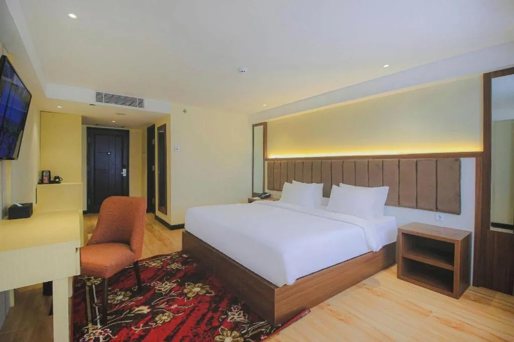 Bed in Grand Qin Hotel Syariah