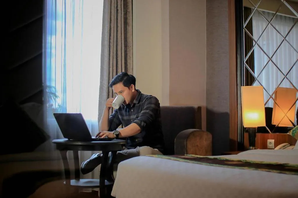 Bed in Grand Qin Hotel Syariah