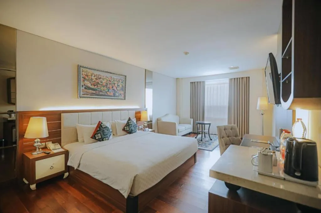 Bed in Grand Qin Hotel Syariah