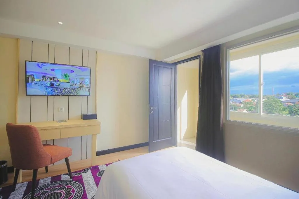 Bed in Grand Qin Hotel Syariah