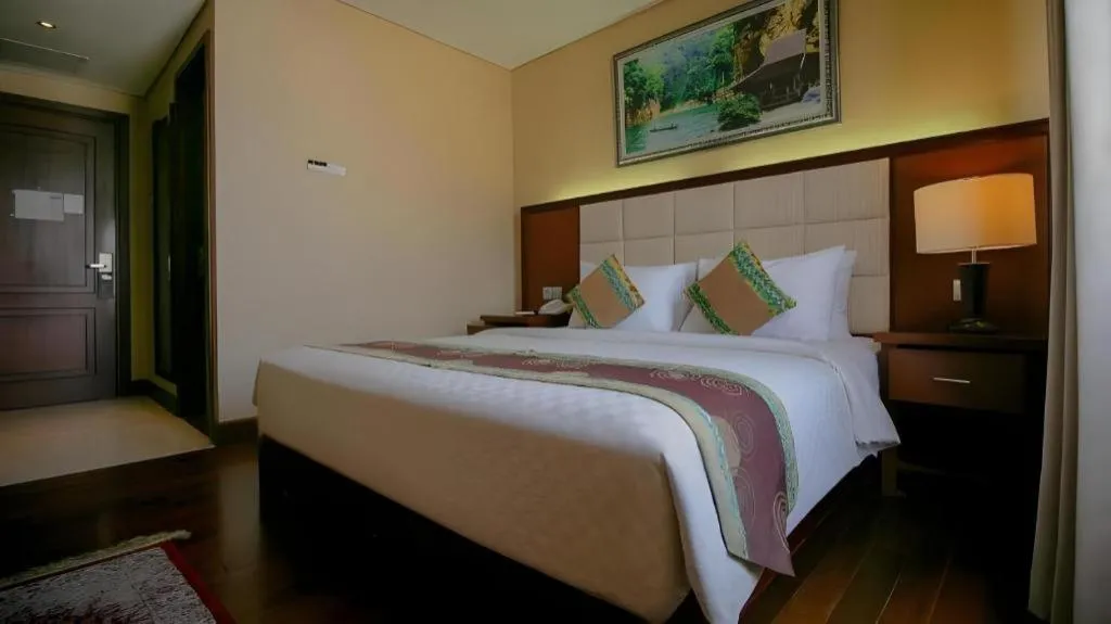Bed in Grand Qin Hotel Syariah