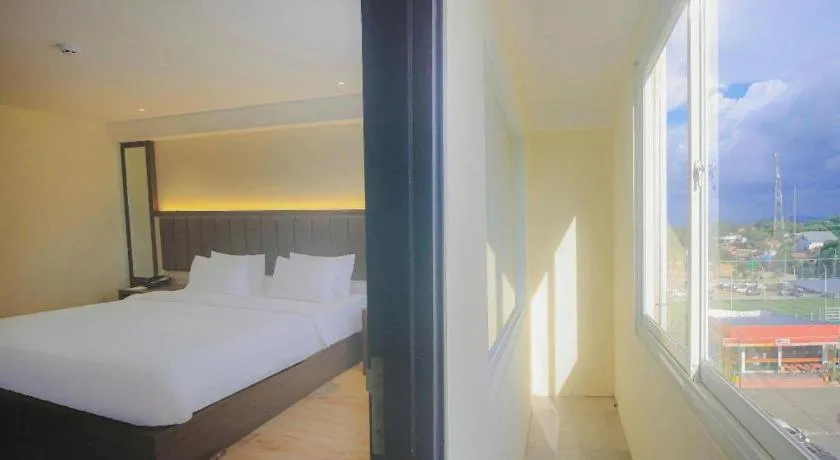 Bed in Grand Qin Hotel Syariah