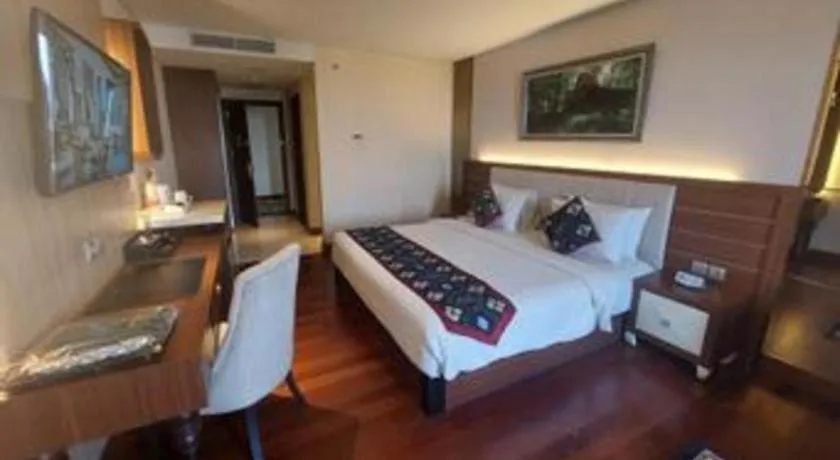 Bed in Grand Qin Hotel Syariah