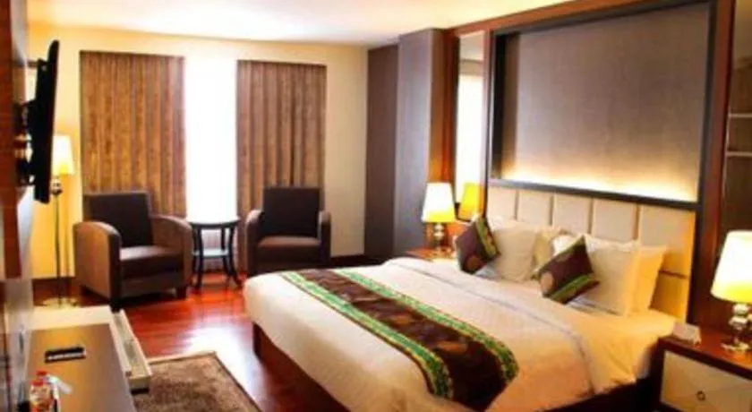 Bed in Grand Qin Hotel Syariah