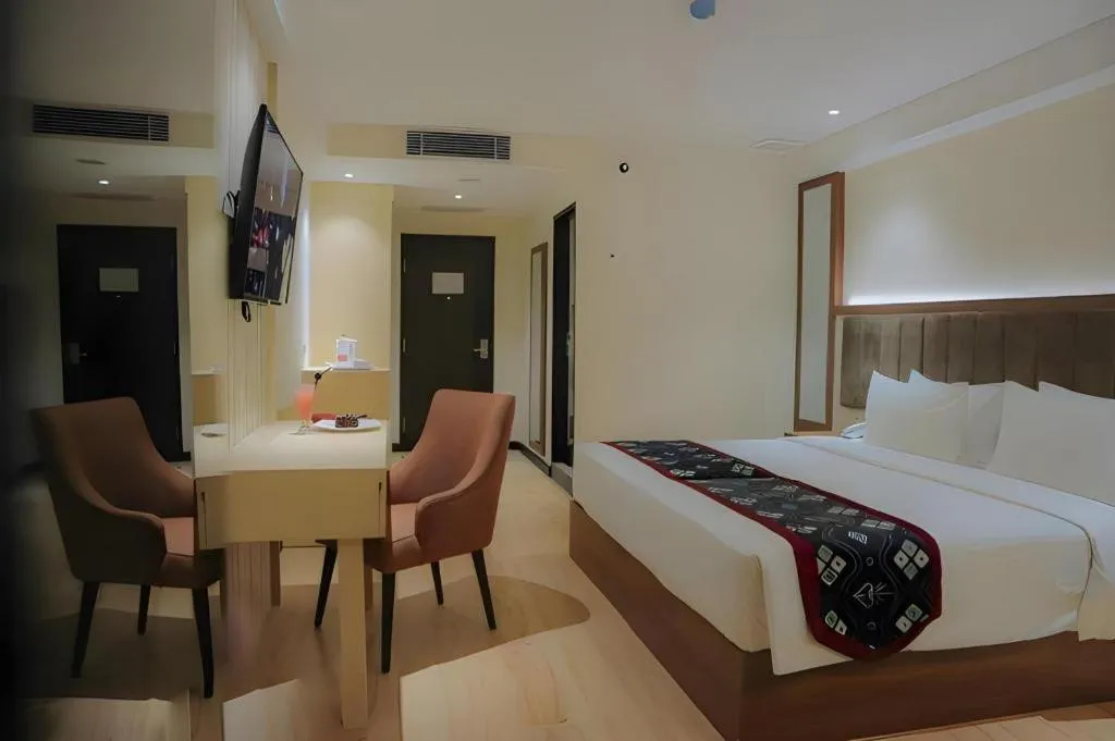 Bed in Grand Qin Hotel Syariah