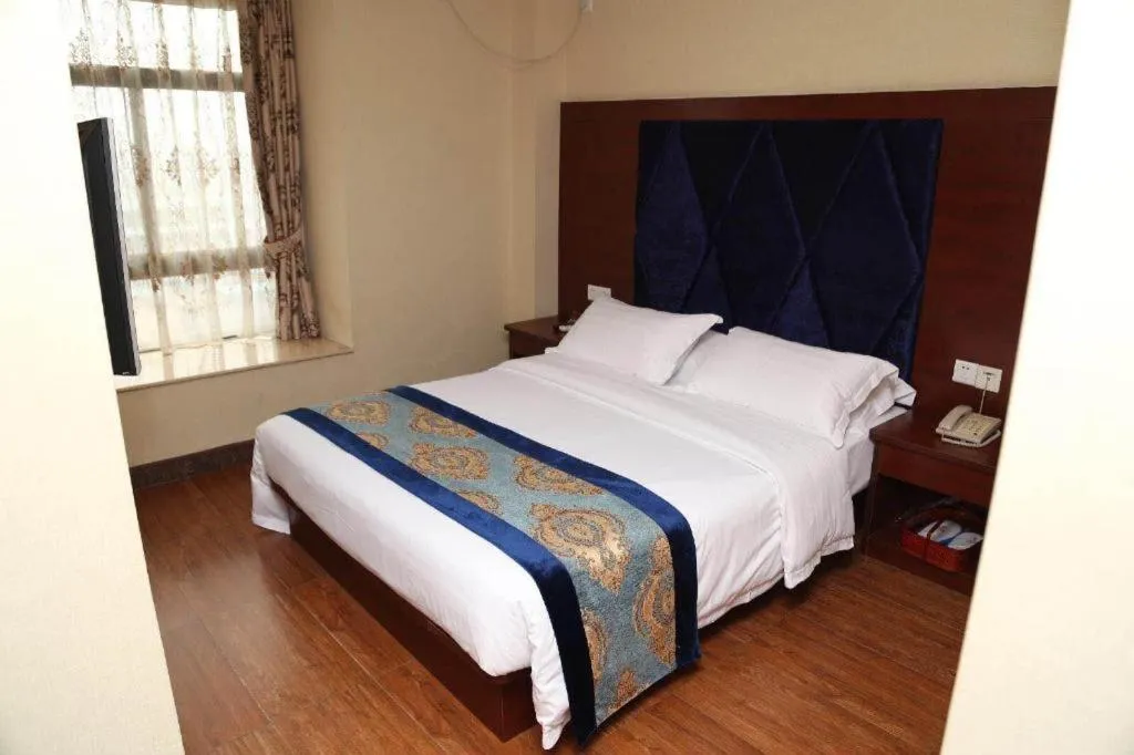 Bed in Guangzhou Junye International Hotel