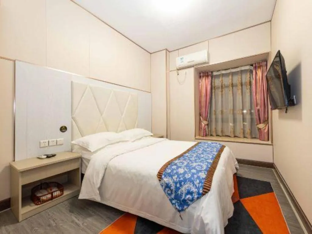 Bed in Guangzhou Junye International Hotel