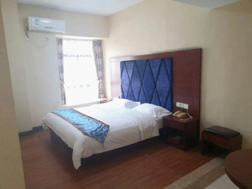 Bed in Guangzhou Junye International Hotel