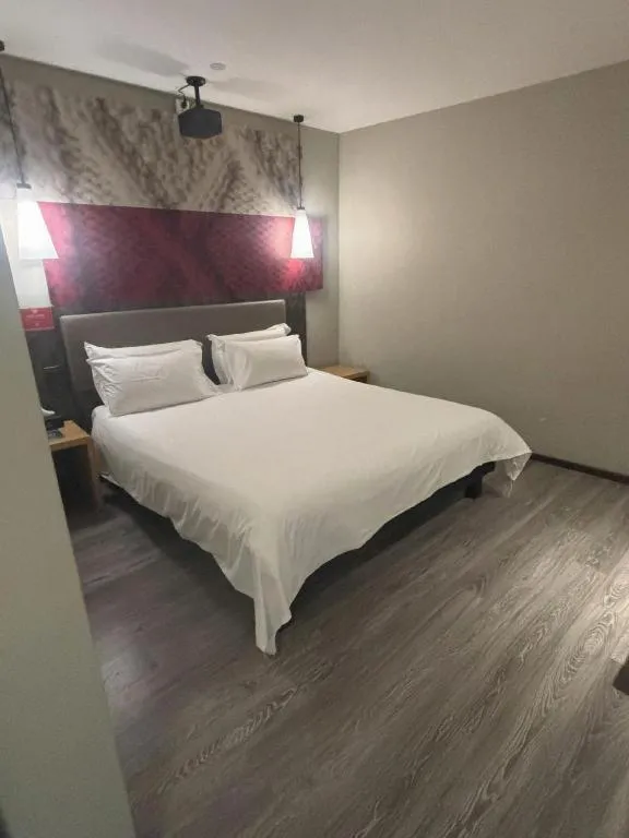 Bed in Hanting Hotel Wuxi Taihu Lake Plaza Branch