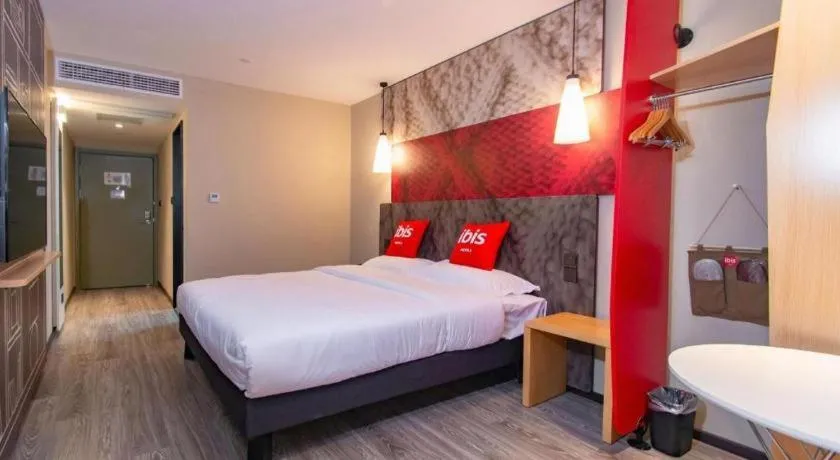 Bed in Hanting Hotel Wuxi Taihu Lake Plaza Branch