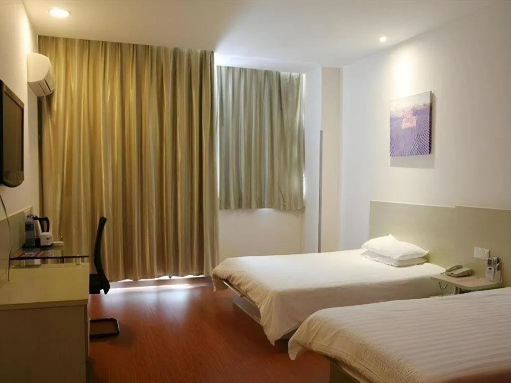 Bed in Hanting Hotel Wuxi Taihu Lake Plaza Branch