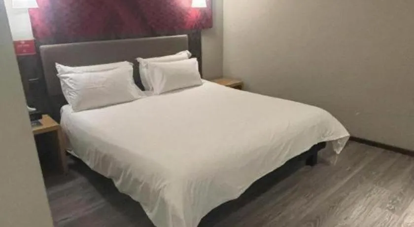 Bed in Hanting Hotel Wuxi Taihu Lake Plaza Branch