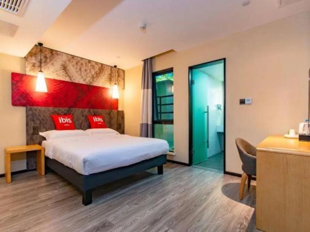 Bed in Hanting Hotel Wuxi Taihu Lake Plaza Branch