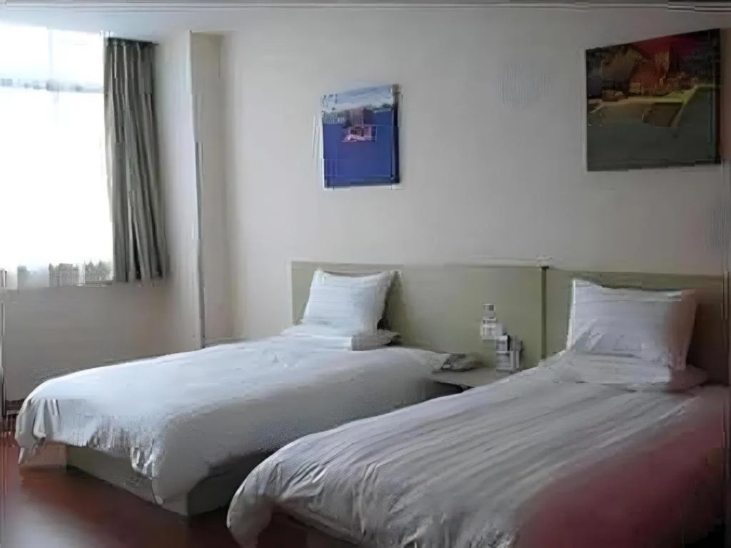 Bed in Hanting Hotel Wuxi Taihu Lake Plaza Branch