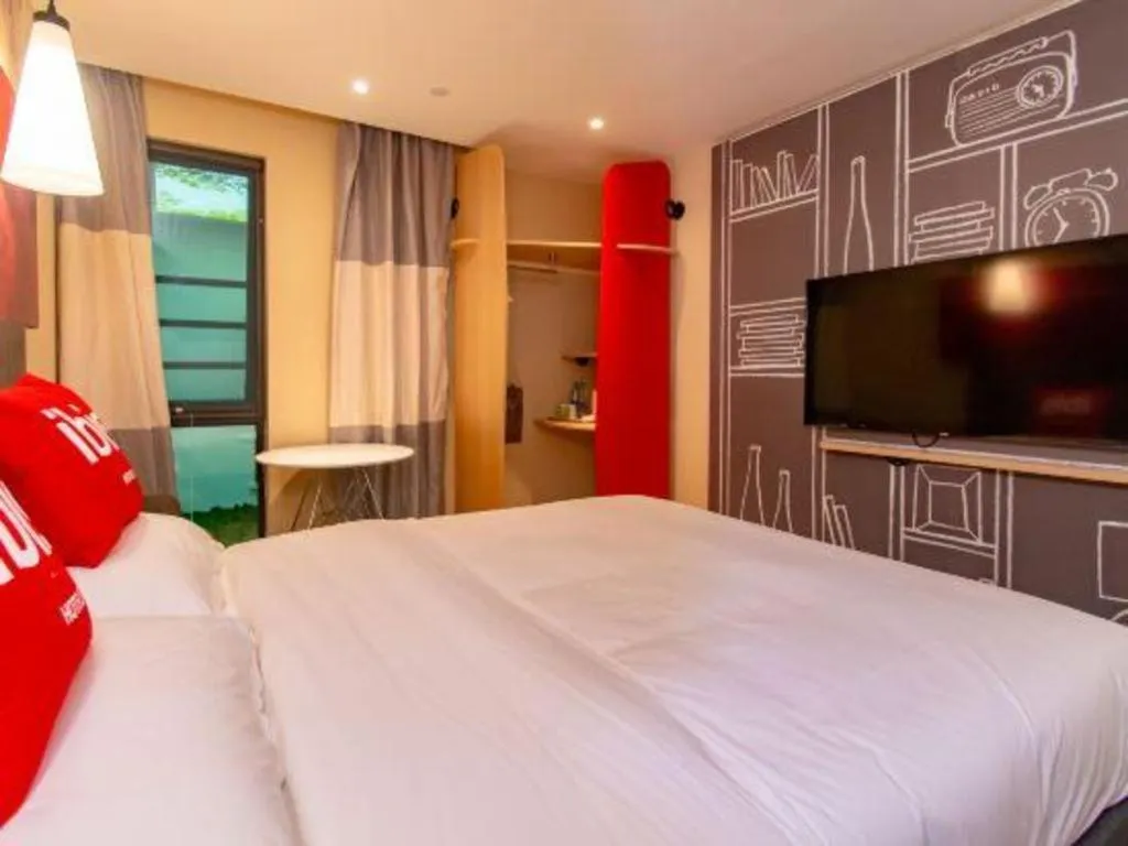 Bed in Hanting Hotel Wuxi Taihu Lake Plaza Branch