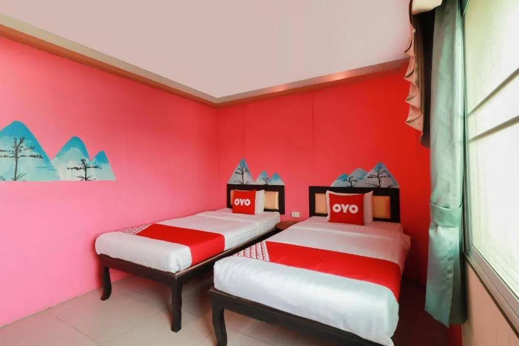 Bed in OYO 768 First Station Hotel