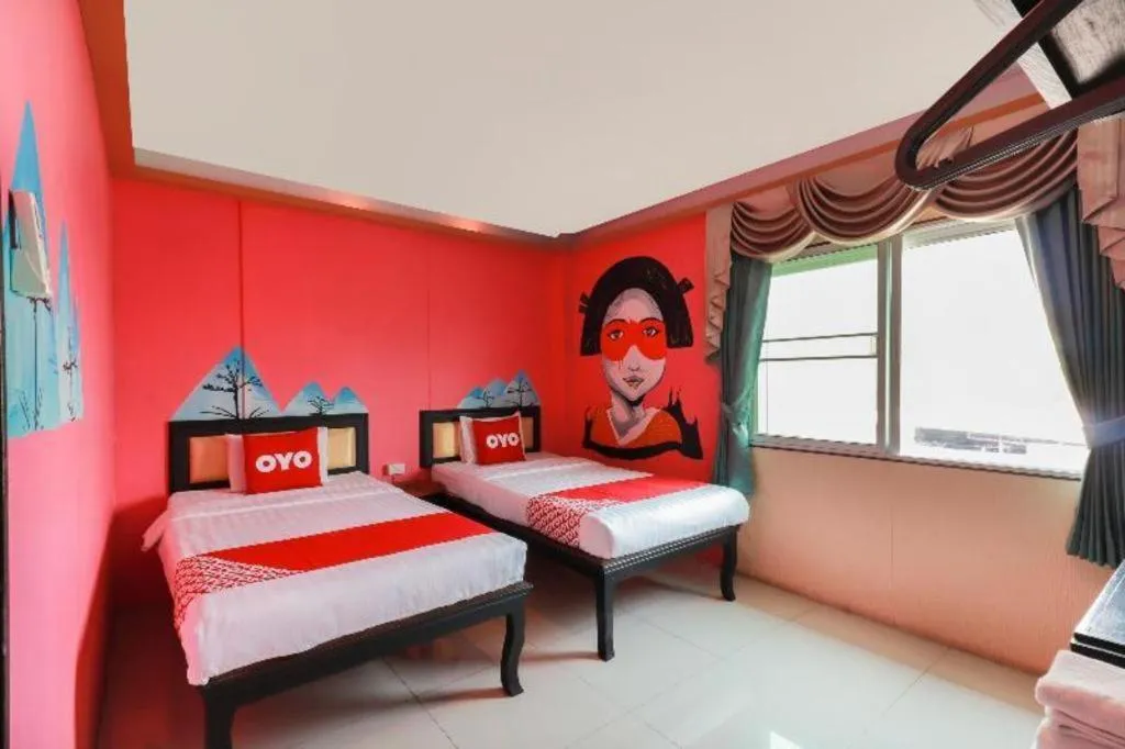 Bed in OYO 768 First Station Hotel