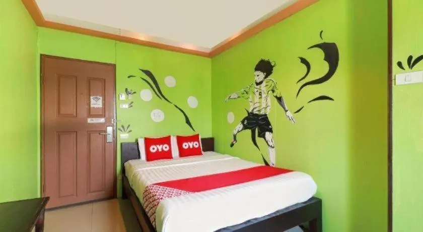 Bed in OYO 768 First Station Hotel