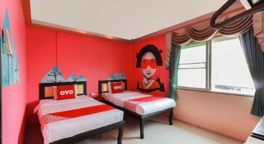 Bed in OYO 768 First Station Hotel