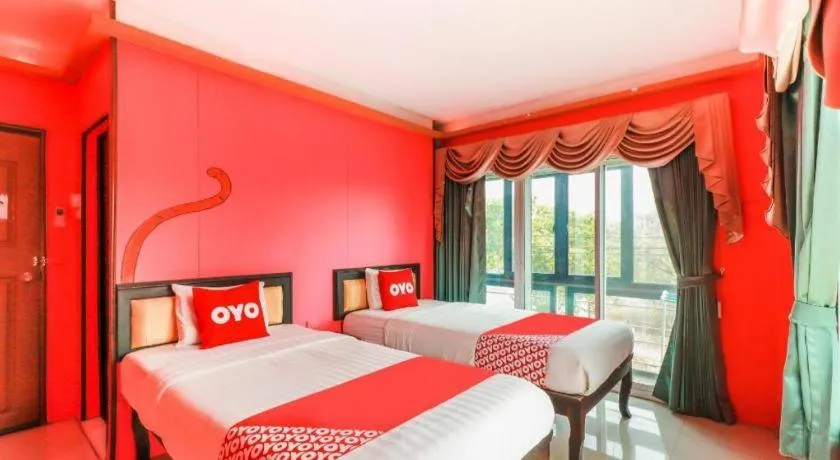 Bed in OYO 768 First Station Hotel