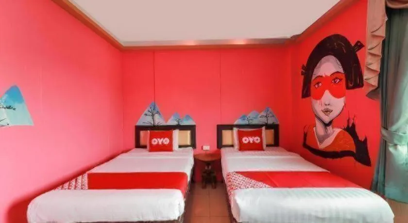 Bed in OYO 768 First Station Hotel