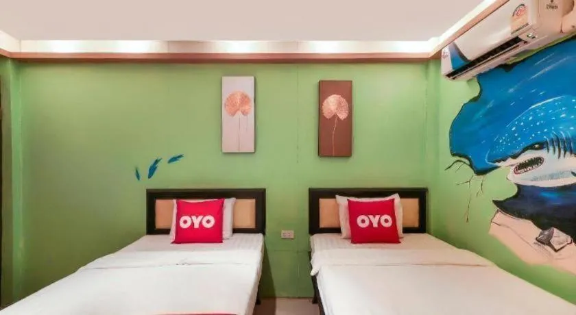 Bed in OYO 768 First Station Hotel