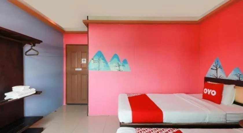 Bed in OYO 768 First Station Hotel