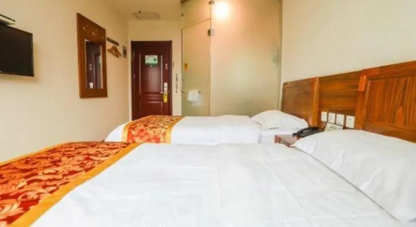 Bed in Beijing Wanjia Traders Hotel