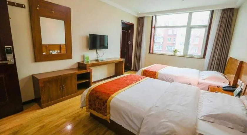 Bed in Beijing Wanjia Traders Hotel