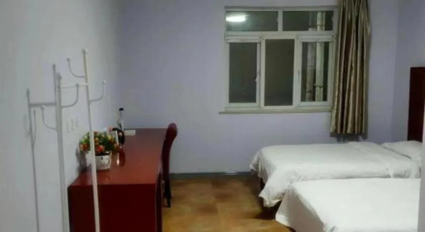 Bed in Beijing Wanjia Traders Hotel