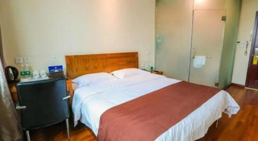 Bed in Beijing Wanjia Traders Hotel