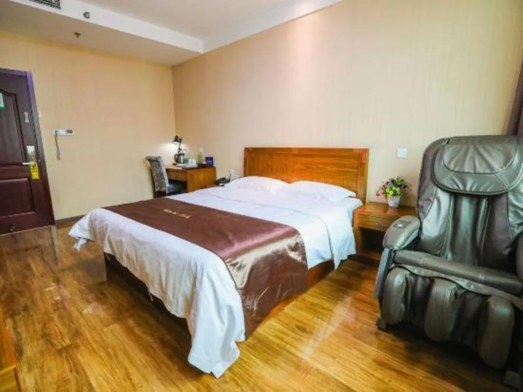 Bed in Beijing Wanjia Traders Hotel