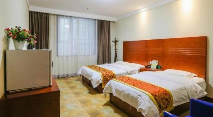 Bed in Beijing Wanjia Traders Hotel