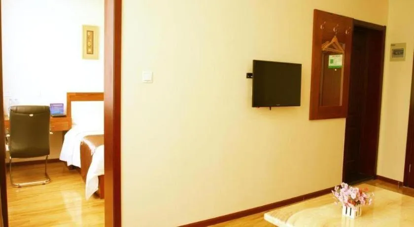 Bed in Beijing Wanjia Traders Hotel